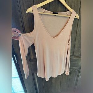 Dynamite shirt with shoulder cut outs.